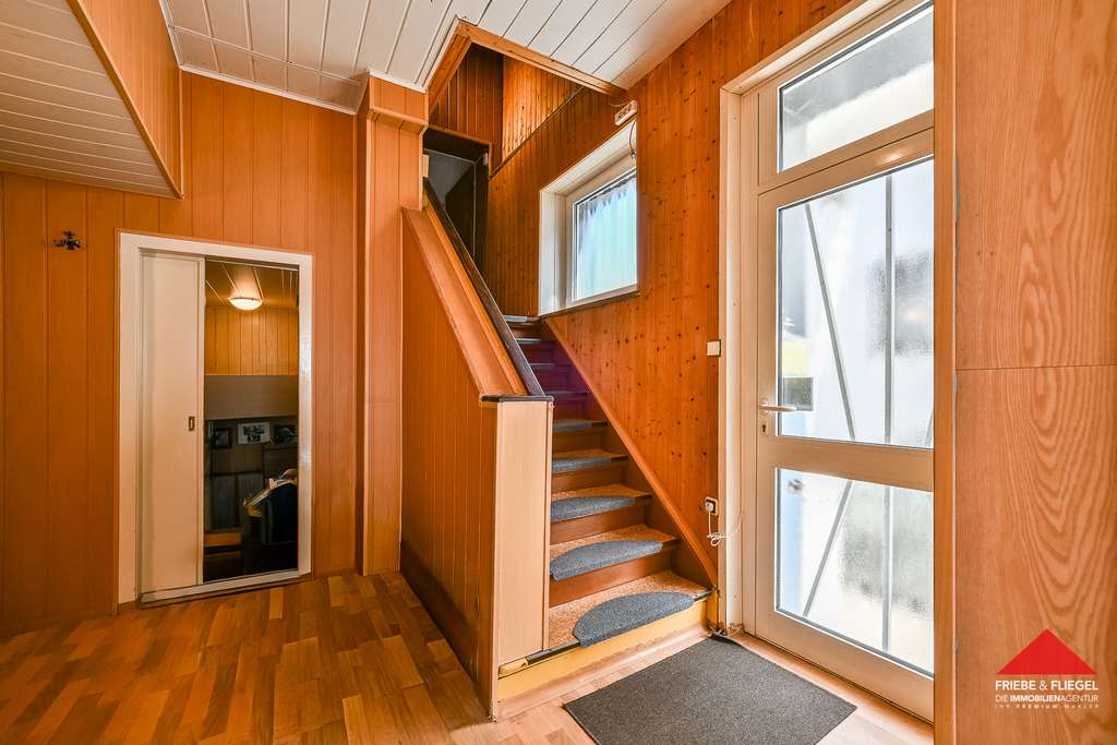 Immobilie in Dortmund - Einfamilienhaus mit Anbau und zwei Kfz-Stellplätzen in ruhiger Sackgassenlage - Bild 3