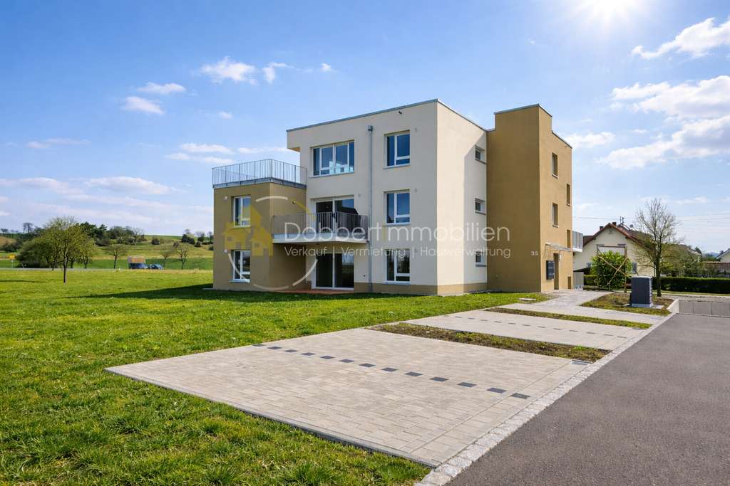 Immobilie in Stimpfach - Erstbezug-Neubau!!  2-Zimmerwohnung in ruhiger Lage mit Gartenanteil - Bild 1