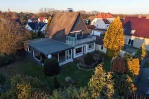Großzügiges und ruhig gelegenes Wohnhaus mit Garten und Wintergarten in Jöllenbeck!