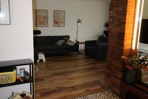 Großzügige 3-Zimmer- Wohnung mit Kamin, Garten & Hobbybereich