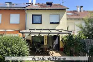 Klein, fein und sonnig – Reihenmittelhaus mit Südterrasse und Garten