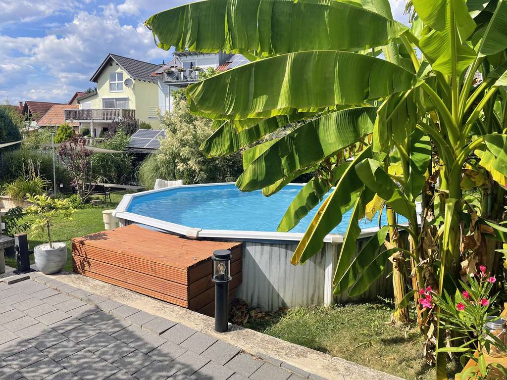 Immobilie in Insheim - Einfamilienhaus mit großem Garten, Pool und Teich in Insheim - Bild 0