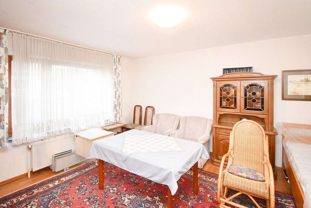 Immobilie in Wallenhorst - Gepflegtes Einfamilienhaus mit Potential auf Erbpachtgrundstück! - Bild 1