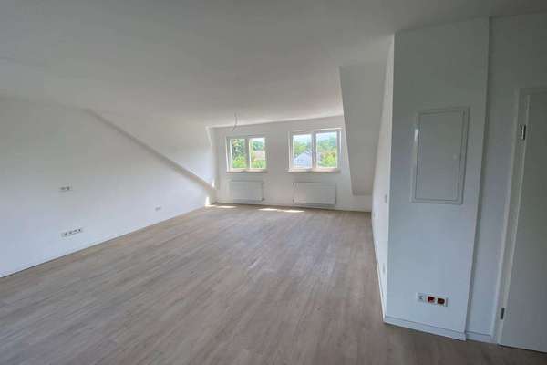 Neubauähnliche 2,5-Zimmer-Wohnung mit stabiler Renditeperspektive in zentraler Lage