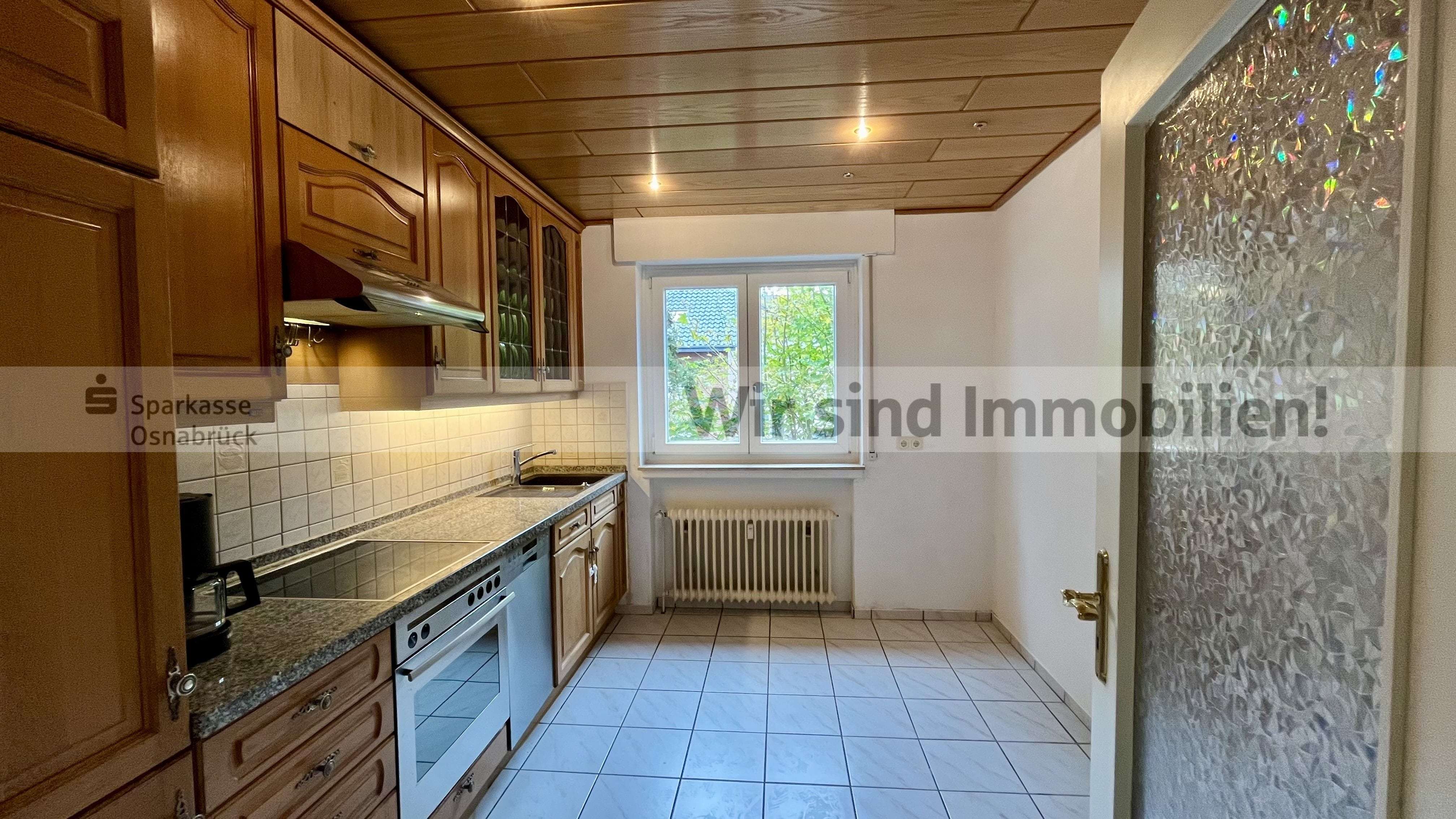 Immobilie in Wallenhorst - Balkon, Keller, Garage und Sitzecke im Garten - Bild 11