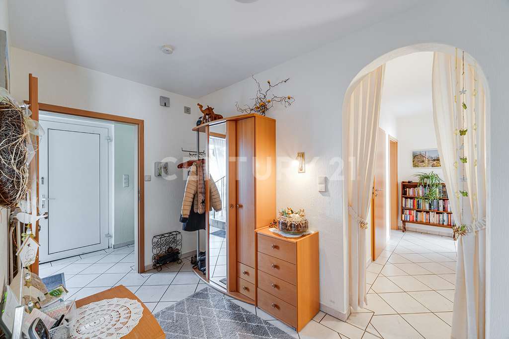 Immobilie in Vollersode - Lichtdurchflutetes Einfamilienhaus in Feldrandlage mit Einliegerwohnung - Bild 1