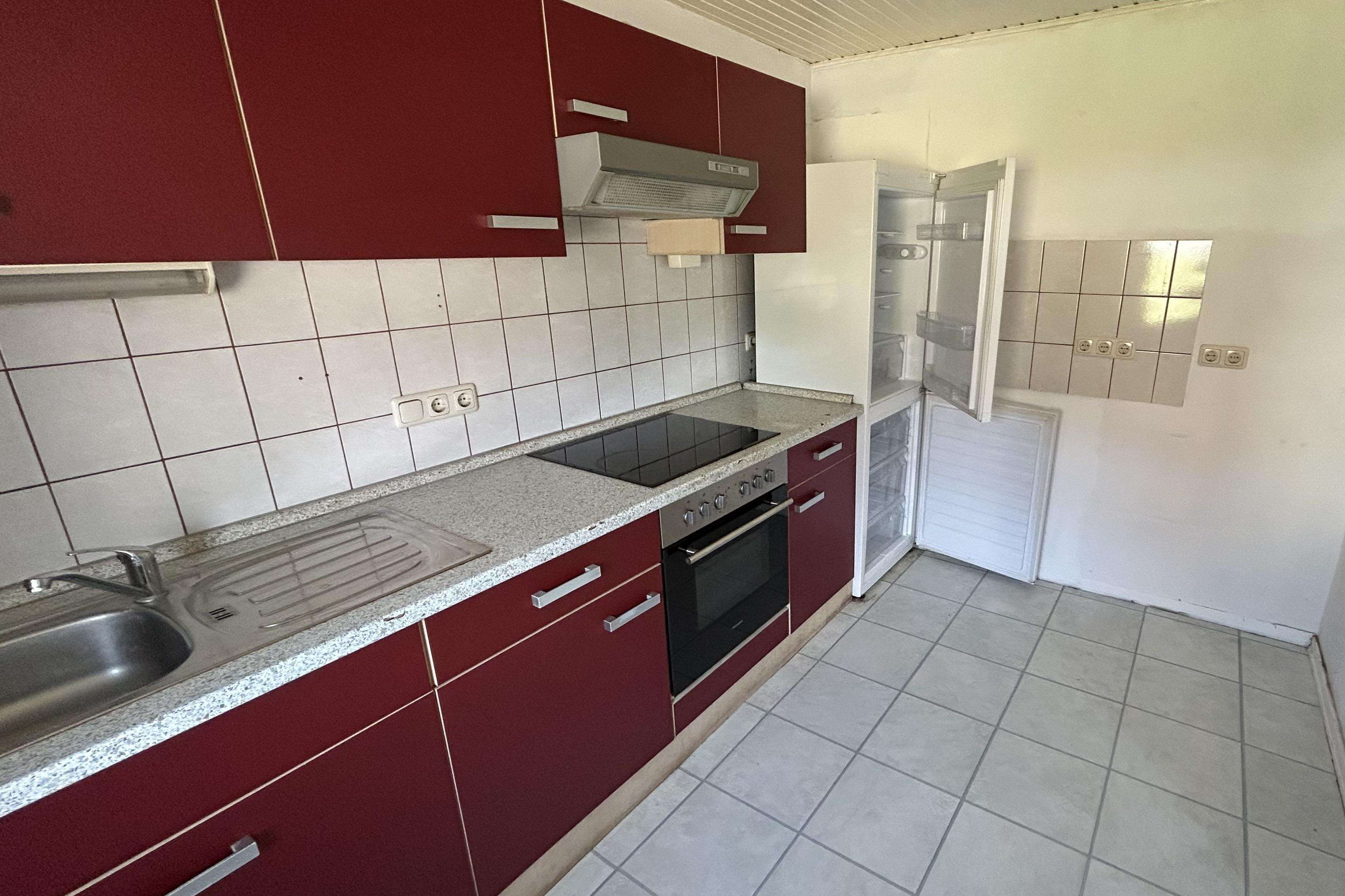 Charmantes Reihenendhaus mit großem Grundstück und Entwicklungspotenzial, Lübeck – Bild 3