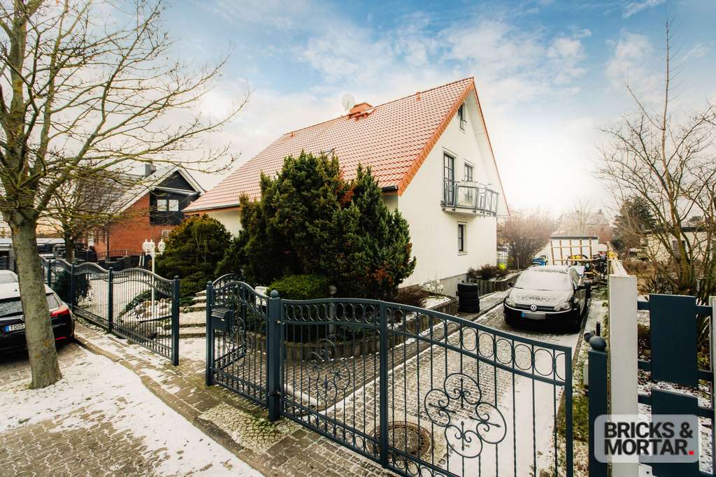 Immobilie in Schkeuditz - Wohntraum für die Familie - Großzügiges Einfamilienhaus mit Kamin & Garten - Bild 2