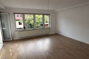 Großzügige 4-Zimmer-Wohnung mit großem Garten, Balkon, Terrasse & Garage in ruhiger Lage