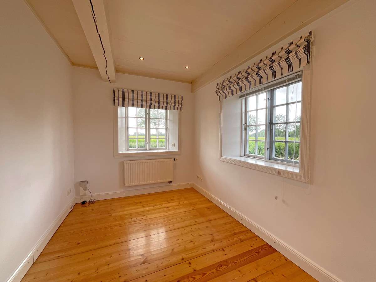 Immobilie in Risum-Lindholm - Stilvolles Reetdachhaus mit einzigartigem Charme und traumhaftem Weitblick - Bild 24