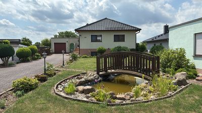 Einfamilienhaus mit Gewerbeimmobilie und Pool