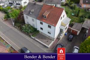 Solides Zweifamilienhaus mit Garten und Garage in Niederhadamar!