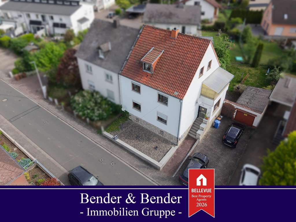 Immobilie in Hadamar - Solides Zweifamilienhaus mit Garten und Garage in Niederhadamar! - Bild 0