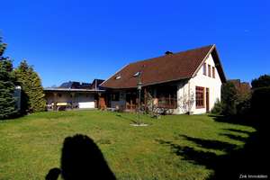 Freistehendes Einfamilienhaus mit wunderschönem Garten, gemauertem Kachelofen, Garage und Stellplatz – Freiherr-vom-Stein-Allee 8, 33378 Rheda-Wiedenbrück – Vorschaubild 2