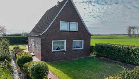 Bild von Fischerdorf Ditzum: Bezugsfreies Einfamilienhaus mit weitem Blick in die Landschaft