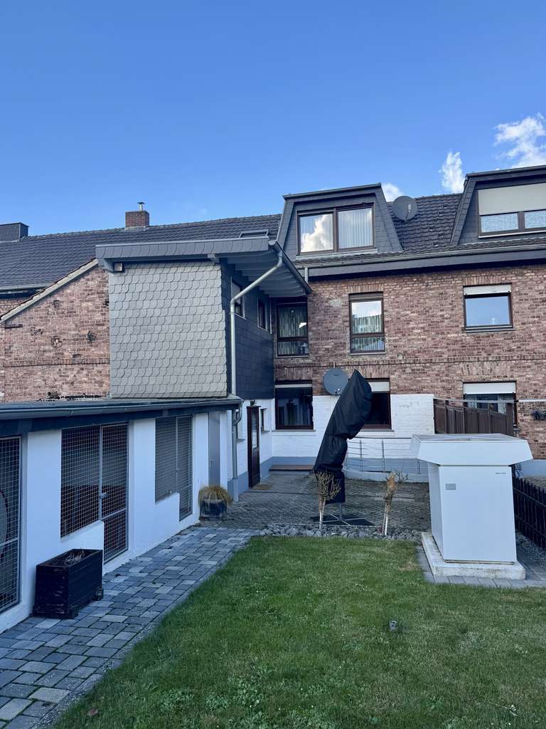 Immobilie in Übach-Palenberg - Mehr Raum für Ideen: Reihenmittelhaus mit Einliegerwohnung und Garten in Übach-Palenberg. - Bild 2