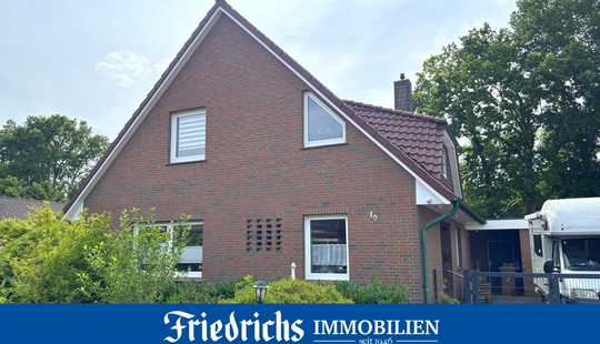 Bild von Einfamilienhaus mit Wintergarten und Garagen-/Werkstattgebäude in ruhiger Wohnlage in WST-Ocholt