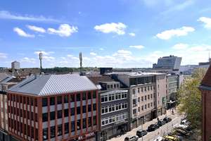 Blick über die City! Exklusive zwei Zimmer Wohnung im Schlossquartier frei!