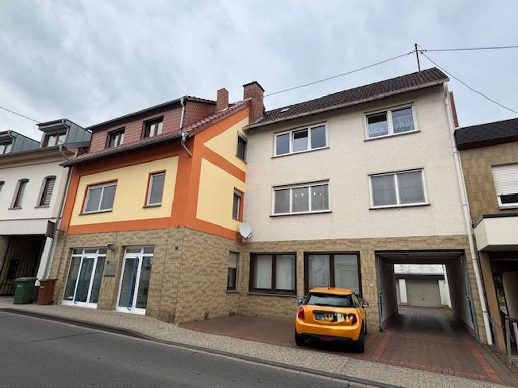 Immobilie in Neuwied - Heimbach-Weis, Wohnhaus mit Gewerbeteil zu verkaufen - Bild 0