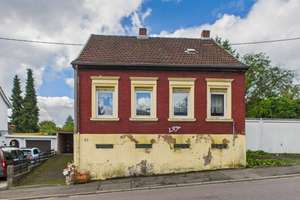 Charmantes Einfamilienhaus mit großem Grundstück und Werkstatt in Saarbrücken-Dudweiler – ideal