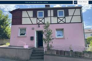 Verkauf: Schnuckeliges Einfamilienhaus mit Weitblick und Sanierungsbedarf in Höhenlage von Höchberg – Die vollständige Adresse der Immobilie erhältst du vom Anbieter., 97204 Höchberg – Vorschaubild 1