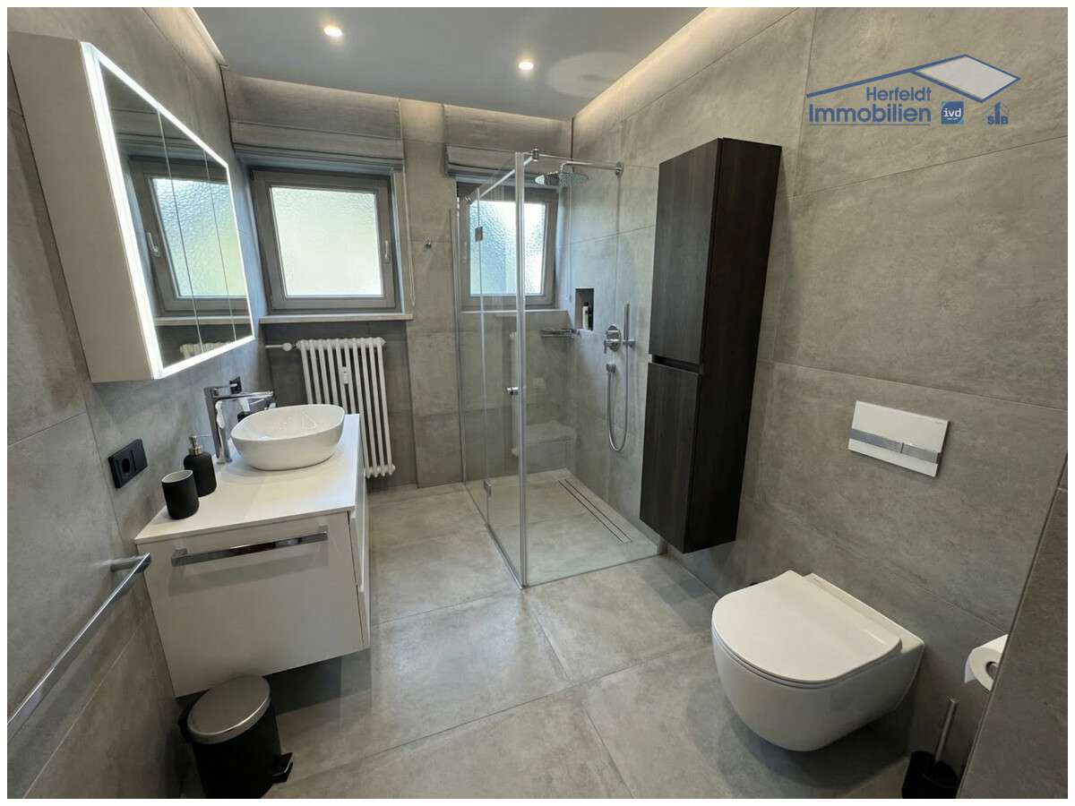 Immobilie in Kaufering - Modernisierte 3-Zimmer-Wohnung mit Süd-Balkon und TG-Stellplatz in zentraler Lage - Bild 11