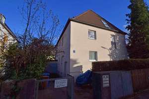 Dachgeschosswohnung mit eigenem Gartenanteil