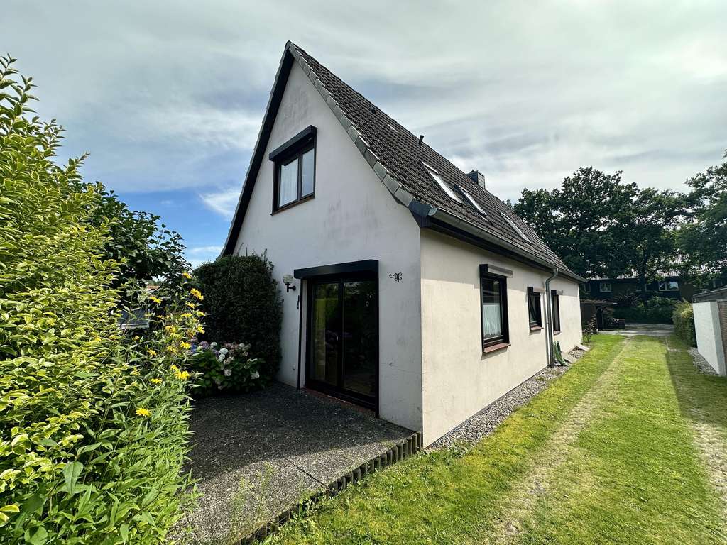 Immobilie in Norderstedt - Charmantes Einfamilienhaus mit Einliegerbereich in ruhiger Lage von Norderstedt - Bild 1