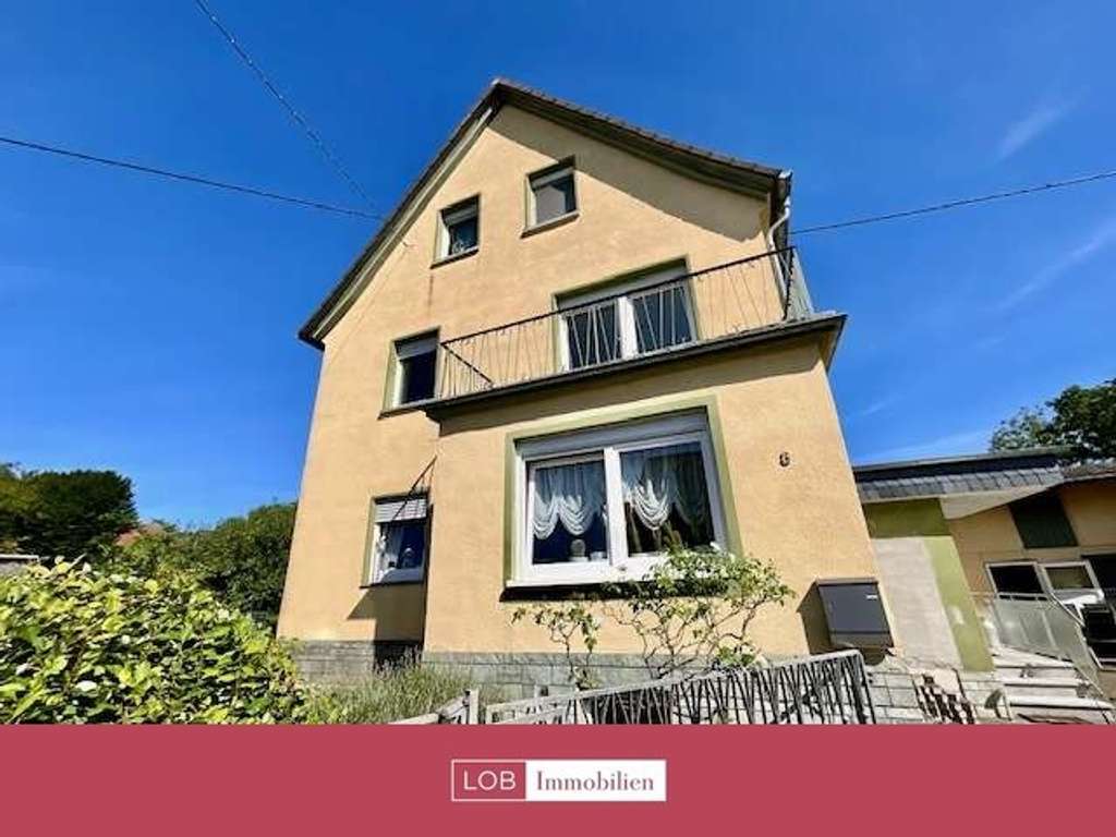 Immobilie in Butzbach - Massiv erbautes Einfamilienhaus mit großem Platzangebot für die Familie / 168 Qm Wfl. - Bild 1