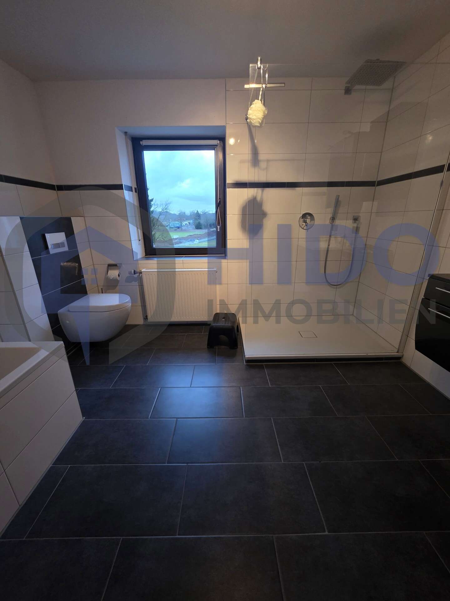 Immobilie in Leuterod - Modernisierte Doppelhaushälfte mit 3 Wohneinheiten in Leuterod - Bild 8