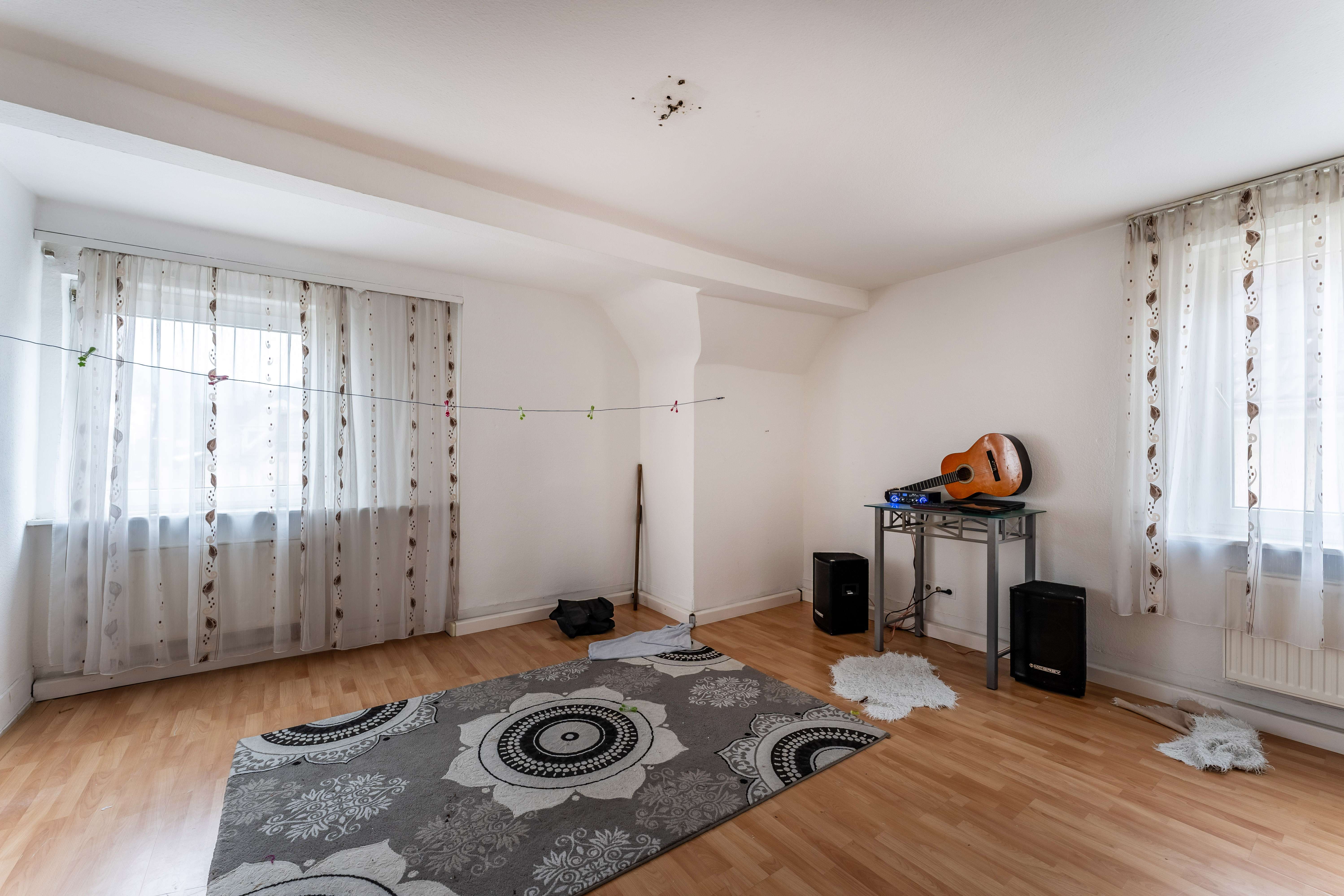 Immobilie in Schramberg - Anlageobjekt mit zwei vermieteten Wohnungen + Ladenlokal und sechs PKW-Stellplätzen - Bild 9