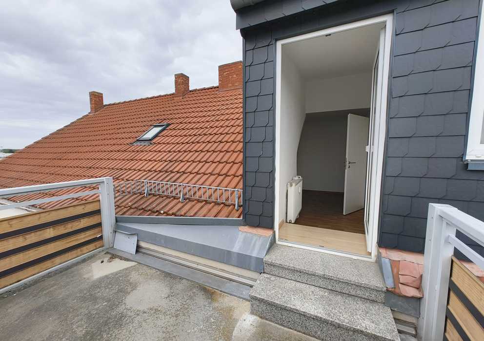 Dachgeschosswohnung mit Balkon in Zentraler Lage