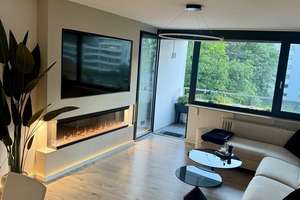 Modernisierte 3-Zimmer-Wohnung mit 2 Loggien, Garage & Aufzug