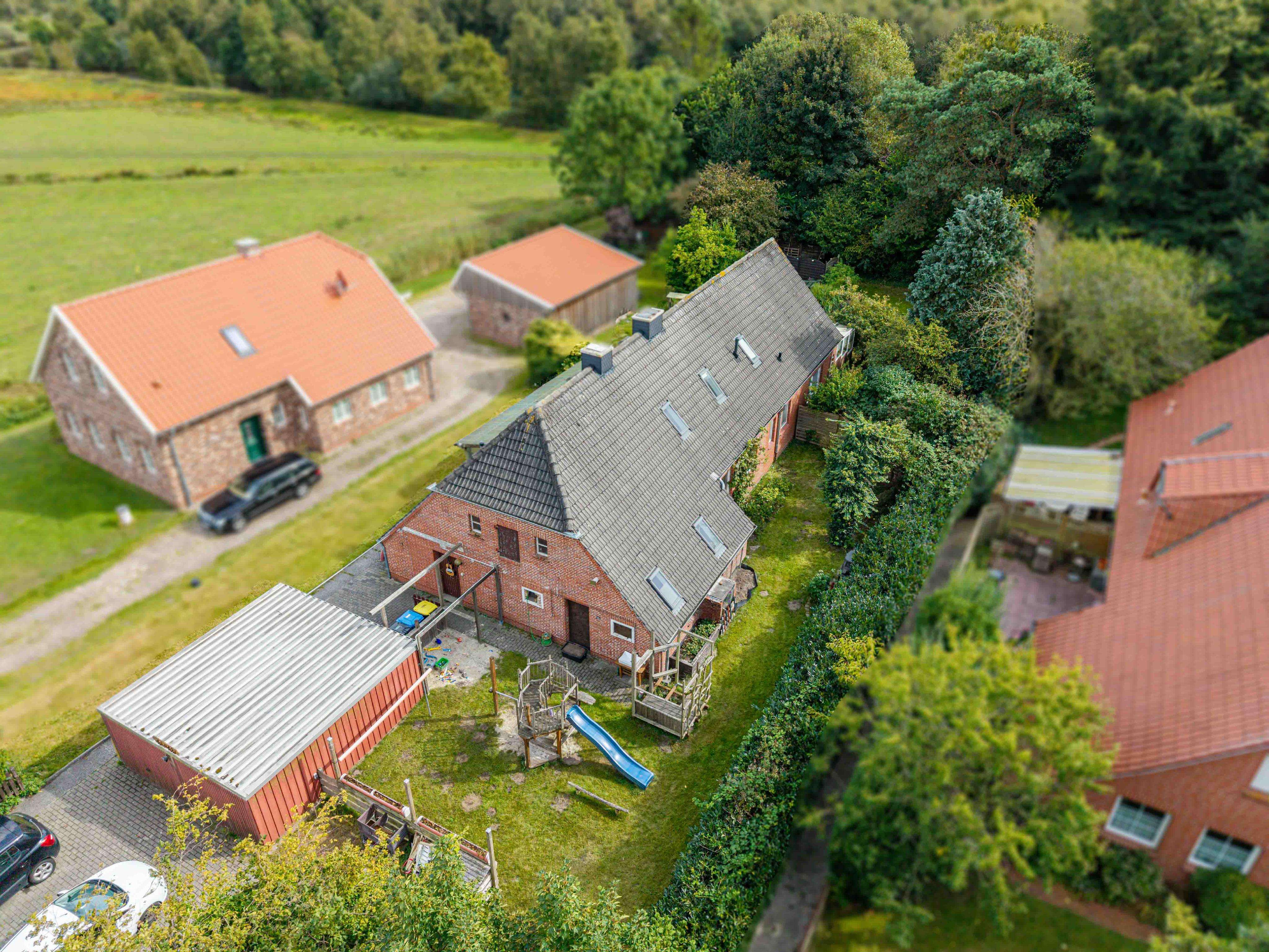 Fehnhaus-Hälfte in ruhiger Lage mit Garten und Ausbaupotenzial, Aurich Kreis – Bild 1