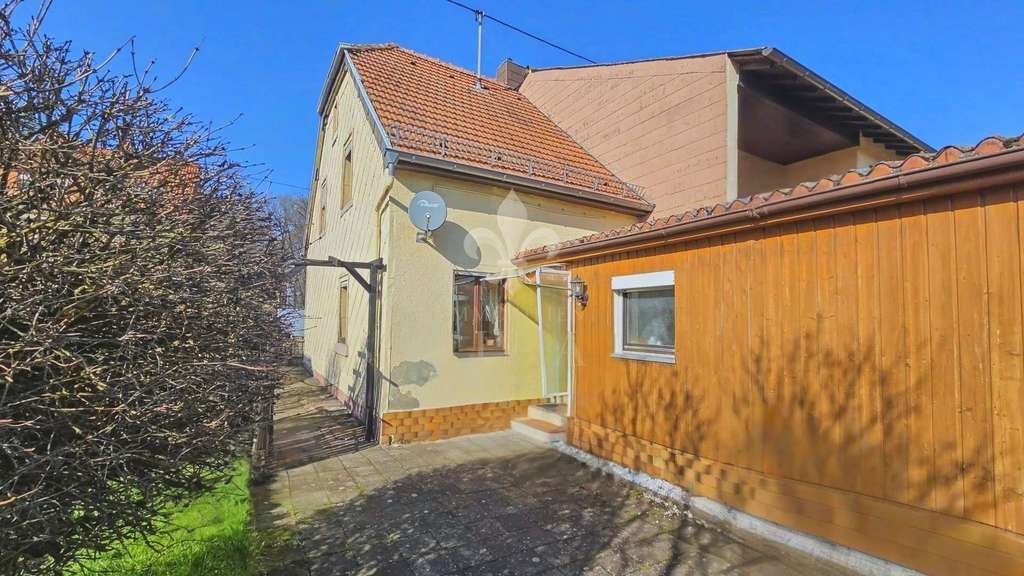 Immobilie in Spiesen-Elversberg - Gemütliches Einfamilienhaus mit großem Garten - Bild 2