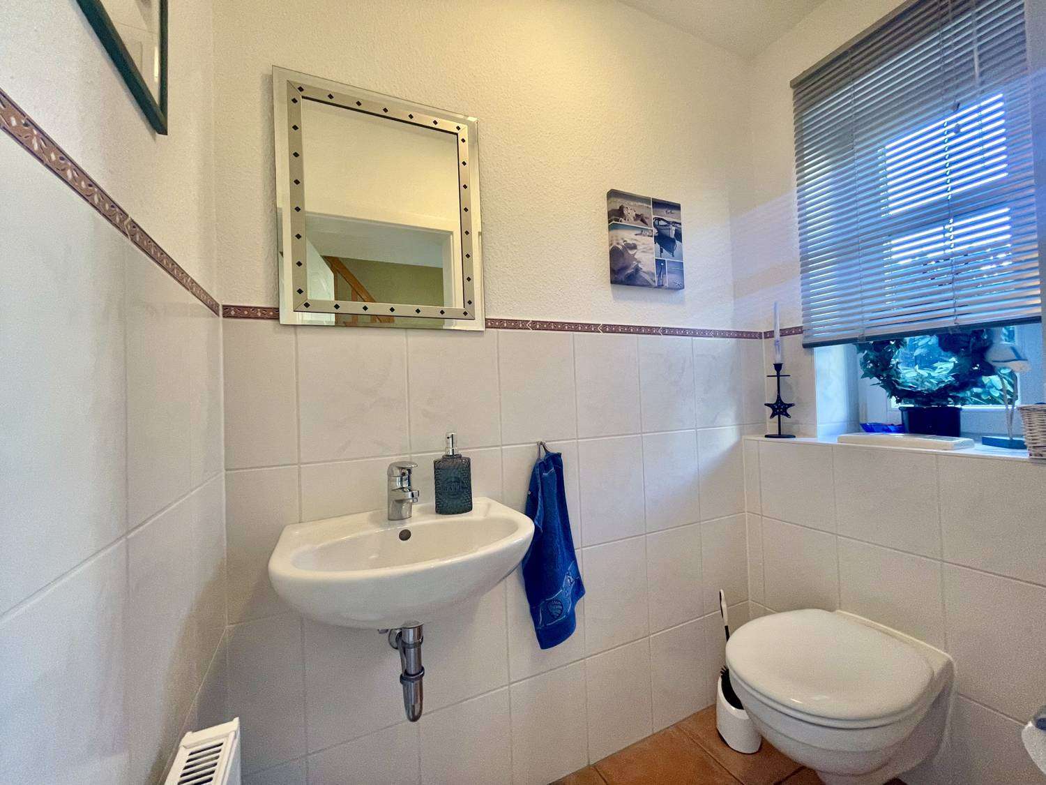 Immobilie in Wyk auf Föhr - Versetzte Bauweise mit Charakter - Ebenerdiges Einfamilienhaus in Wyk auf Föhr - Bild 12