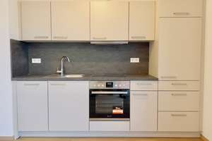 Tolles Neubau- Appartement mit Einbauküche, Fußbodenheizung, Loggia, Lift, Tiefgarage etc