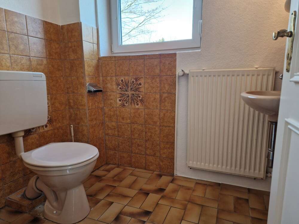 Immobilie in Owschlag - Raum für Ihre Wohnträume: Vielseitiges Zweifamilienhaus mit großem Garten und zwei Garagen - Bild 6