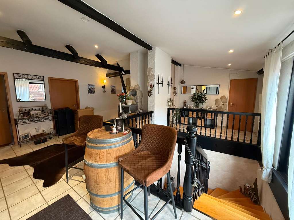 Immobilie in Neustadt am Rübenberge - Helle 3–4-Zimmer-Wohnung mit großer Dachterrasse, Kamin, Sauna und Garage in Neustadt am Rübenberge - Bild 0