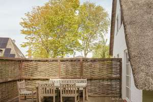 Friesische Maisonette unter Reet mit Terrasse & Garten
