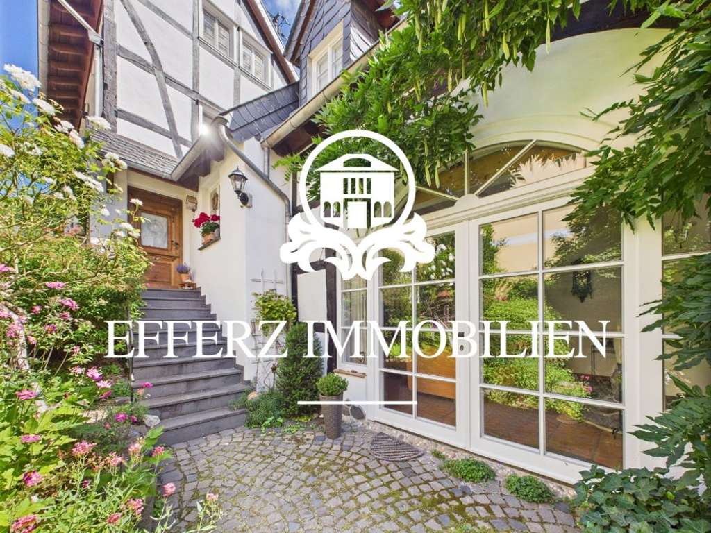 Immobilie in Remagen - Zeitlose Eleganz: Denkmalgeschütztes Fachwerkjuwel in Split-Level-Architektur! - Bild 0