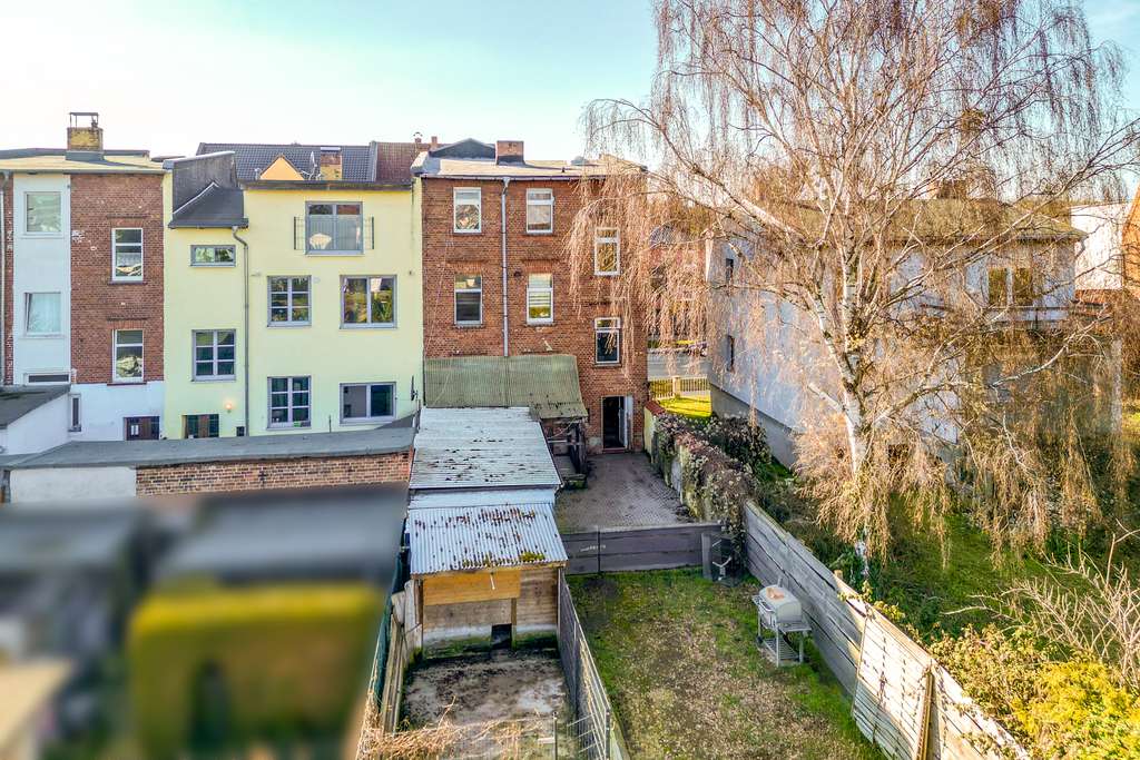 Immobilie in Schönebeck (Elbe) - Charmantes Reihenendhaus mit Gartenidylle und vielseitigem Raumkonzept auf drei Ebenen - Bild 1