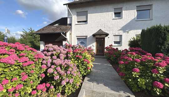 Bild von Ruhiges Familienparadies - Charmantes Reihenendhaus in Rosbach mit Garten & Garage