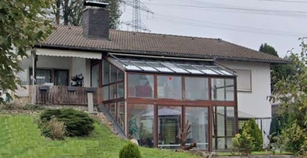 Immobilie in Bad Säckingen - Einfamilienhaus mit Einliegerwohnung
und Garage - Bild 0