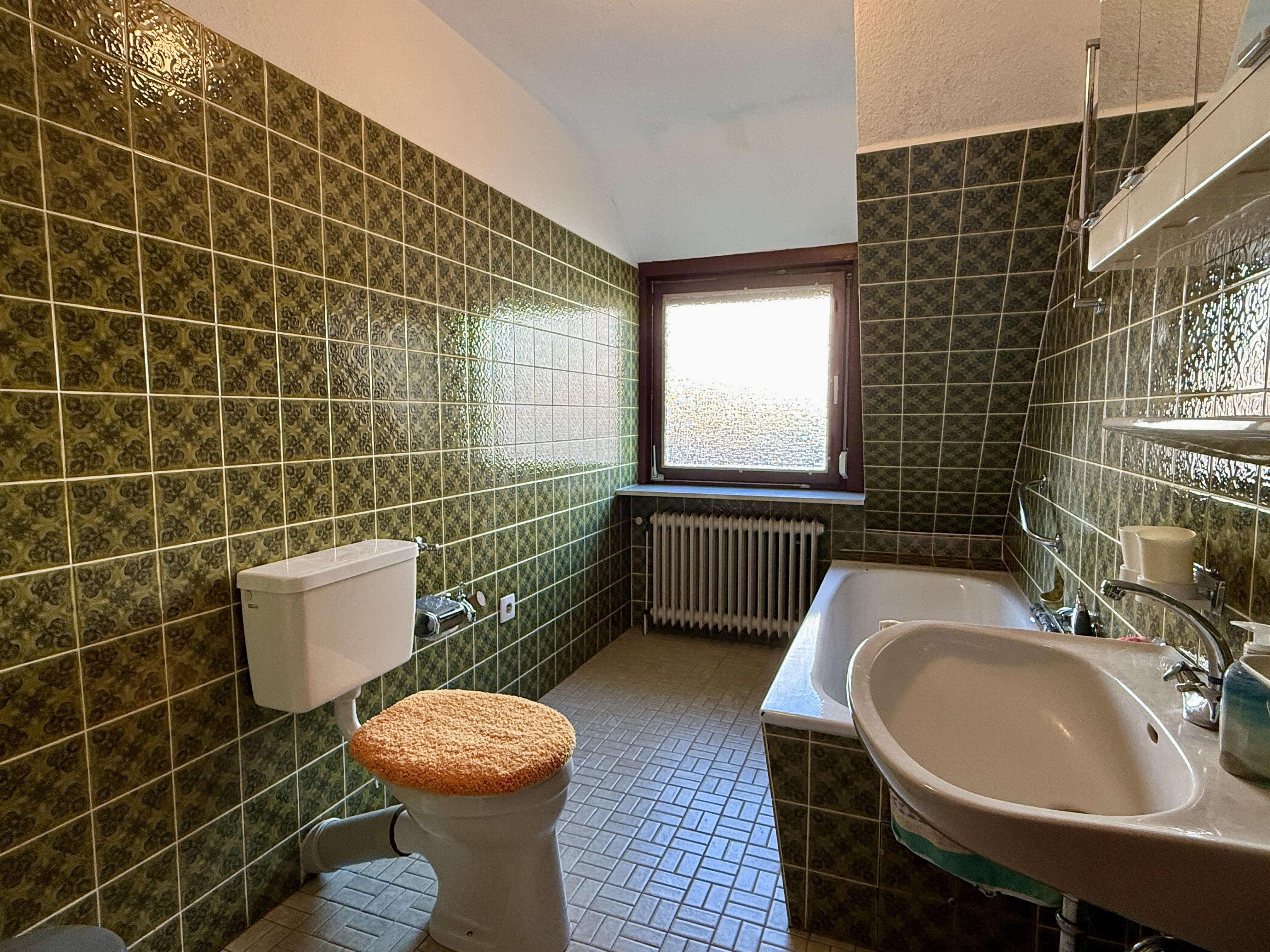 Immobilie in Hude (Oldenburg) - Zweifamilienhaus mit großem Grundstück und viel Nutzfläche - Bild 16