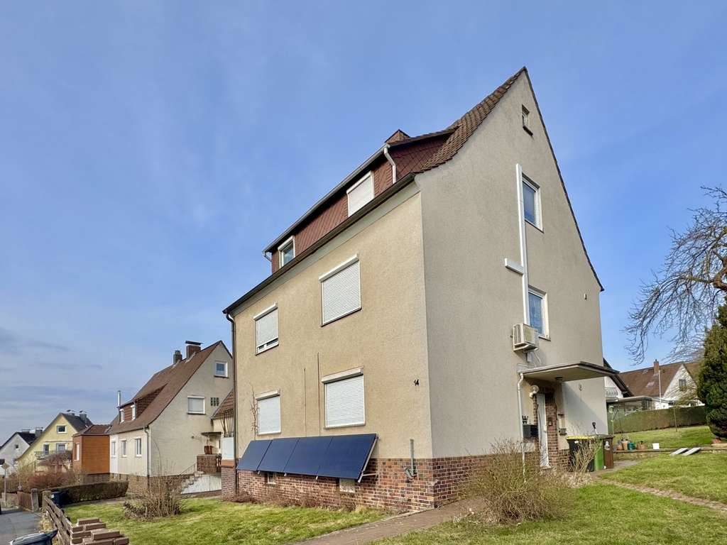 Immobilie in Fuldabrück - Vielseitig nutzbares Zweifamilienhaus mit

ausgebautem Dachgeschoss in schöner Wohnlage v. Bergshs - Bild 1