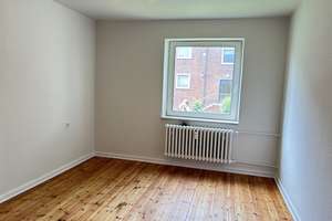 Erdgeschosswohnung mit schickem Dielenboden! – Hertzstraße 76, 24149 Neumühlen-Dietrichsdorf, Kiel – Vorschaubild 2