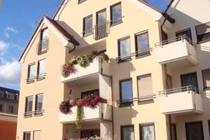 Stadtmitte: 1-Zimmer-Wohnung mit Balkon und Tiefgarage