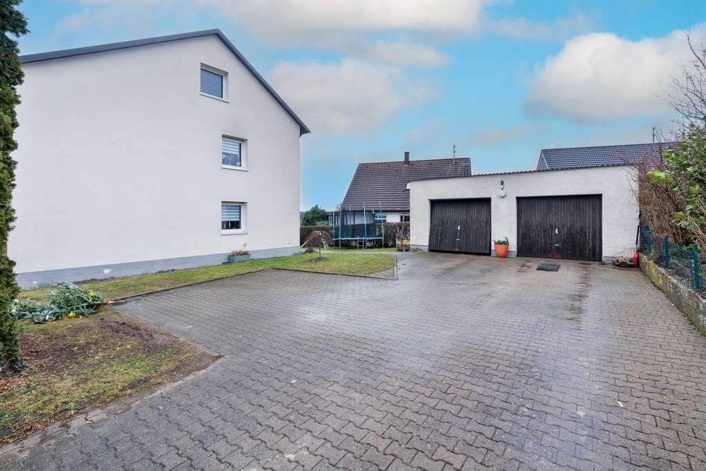 Immobilie in Achstetten - Zweifamilienhaus in Achstetten – Vollvermietete Kapitalanlage mit 2 Wohneinheiten - Bild 2