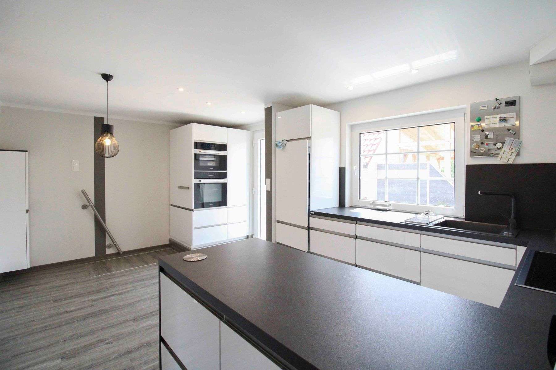 Immobilie in Tribsees - Modernisierte Doppelhaushälfte mit Anbau, Photovoltaik und schönem Garten in Tribsees - Bild 9